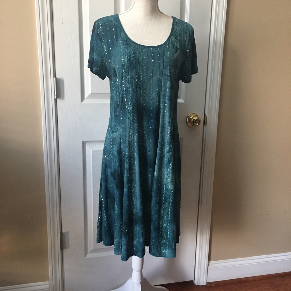 Teal green dress.